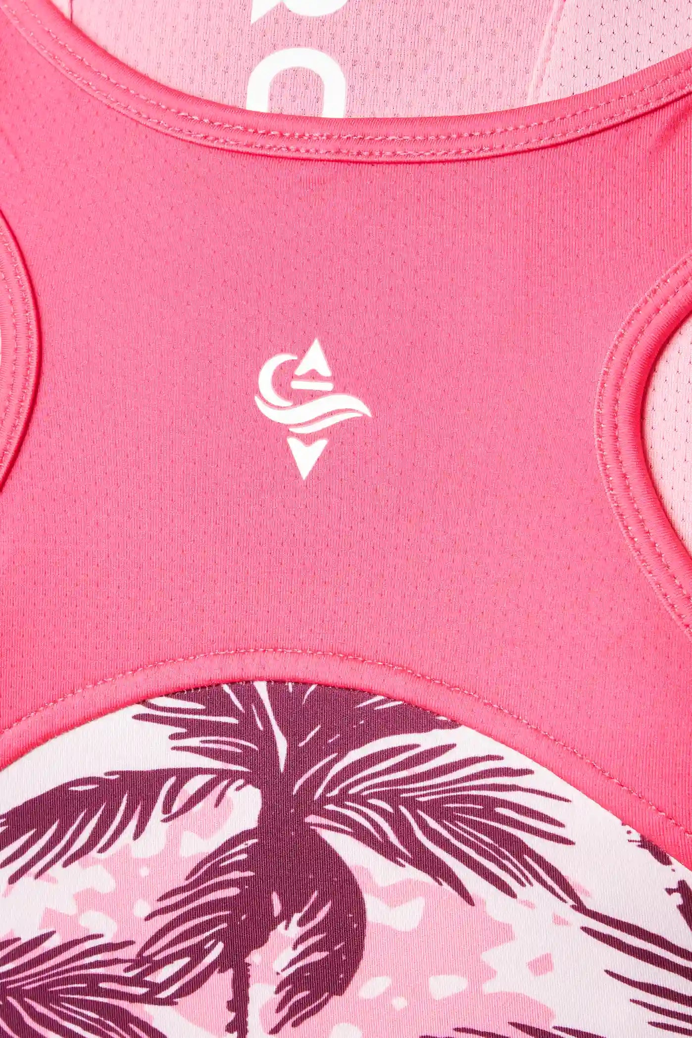 Pink palms print women's coastal rowing all-in-one with recycled fabric and mesh panels